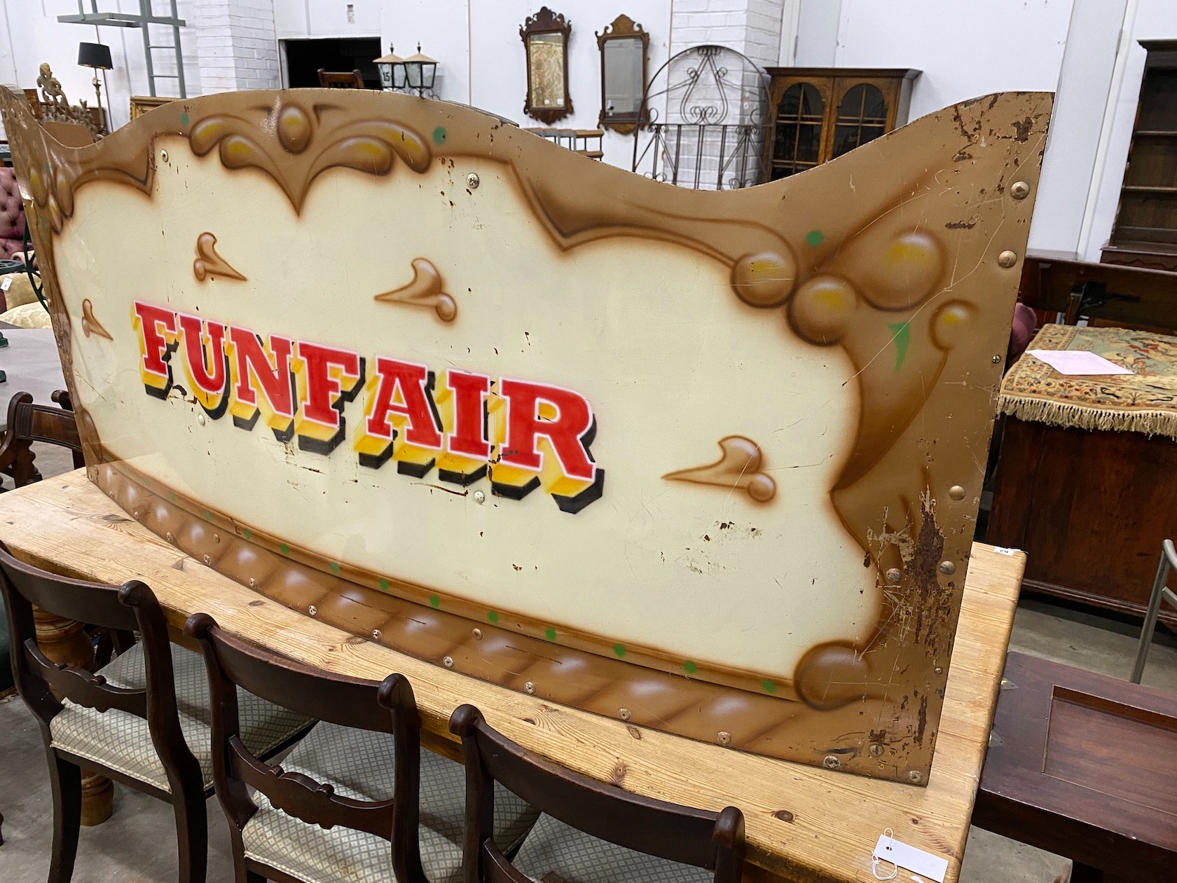 An enamel funfair panel, width 170cm, height 76cm